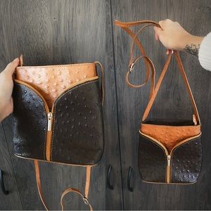 brown leather crossbody bag with zipper detail